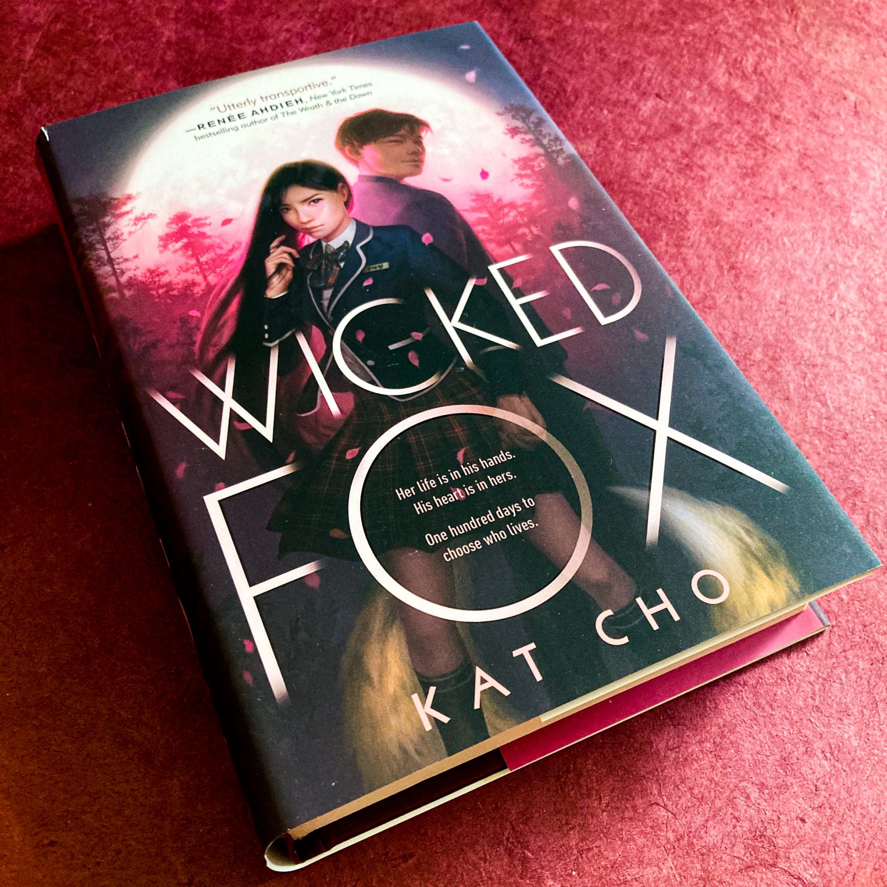 Hardcover of Wicked Fox on a maroon background