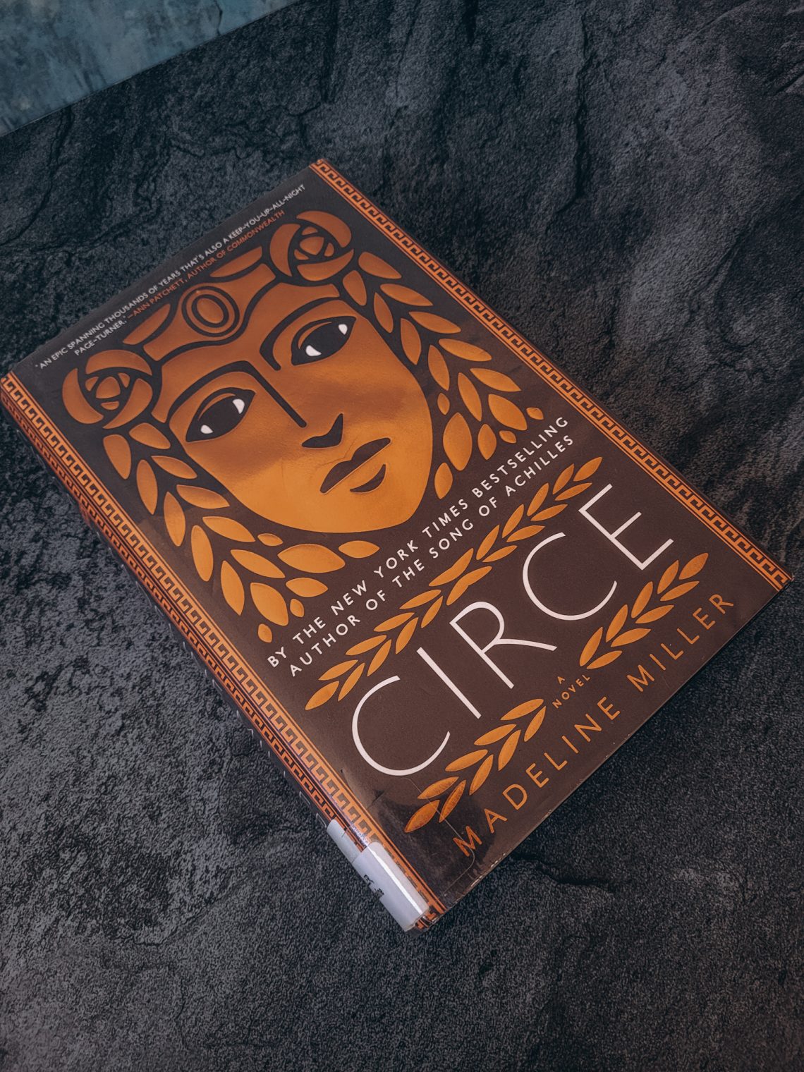 Hard cover copy of Circe on blue marble background